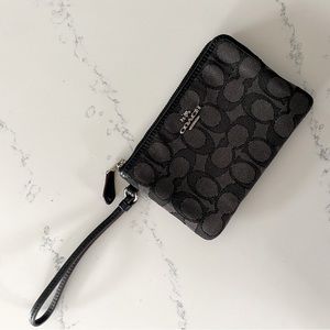 Brand new Coach zip wristlet